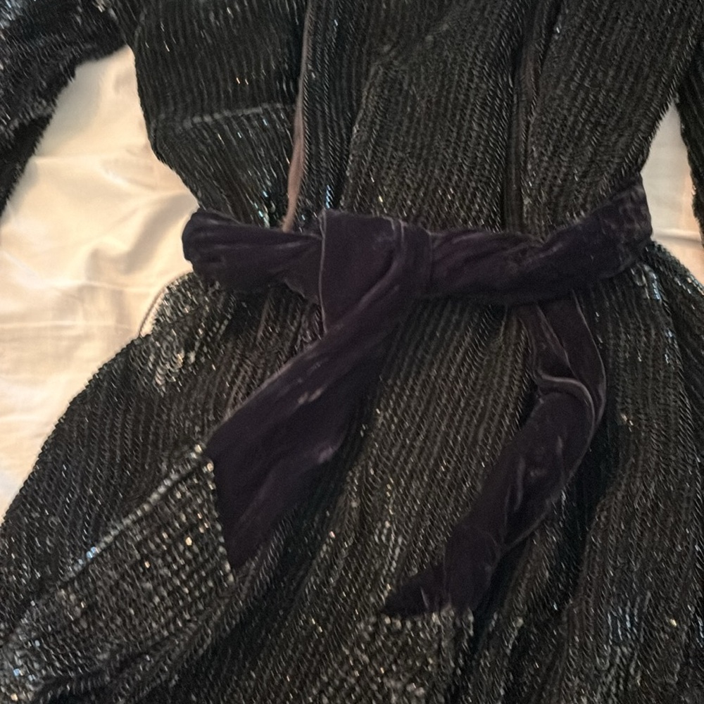 Black sequin mini dress by Retrofete